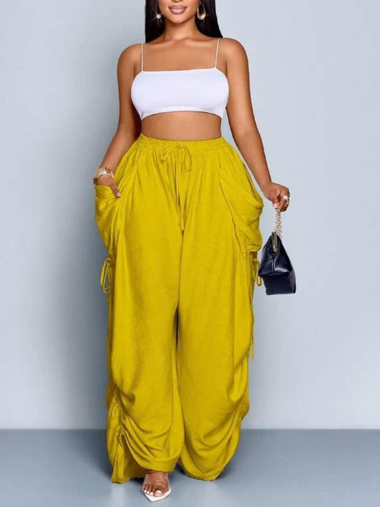 Plus Size Women Solid Color Casual Loose Pocket Drawstring Pants - allsose